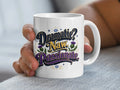 White mug with "Dramatic? Naw. Passionate." text and thistle designs.