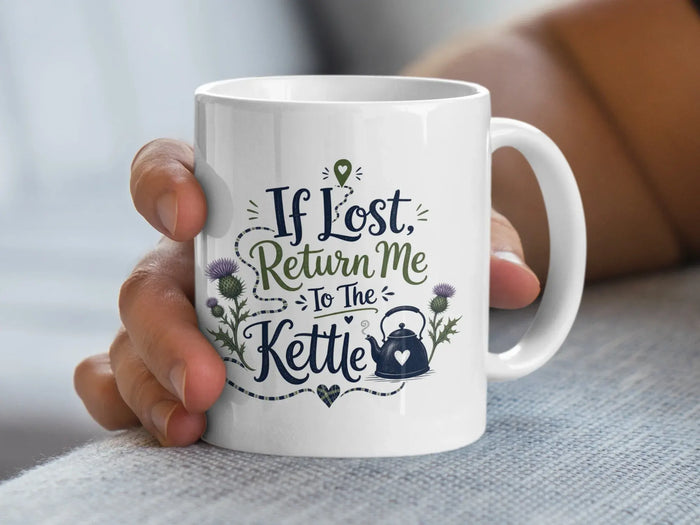 White mug with "If Lost, Return to the Kettle" and thistle graphic.