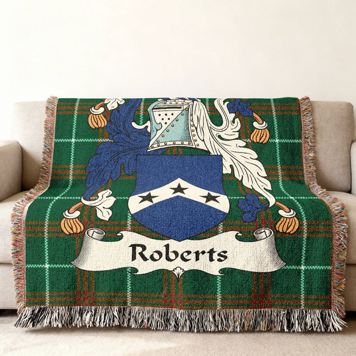 Roberts family crest woven throw blanket on couch.