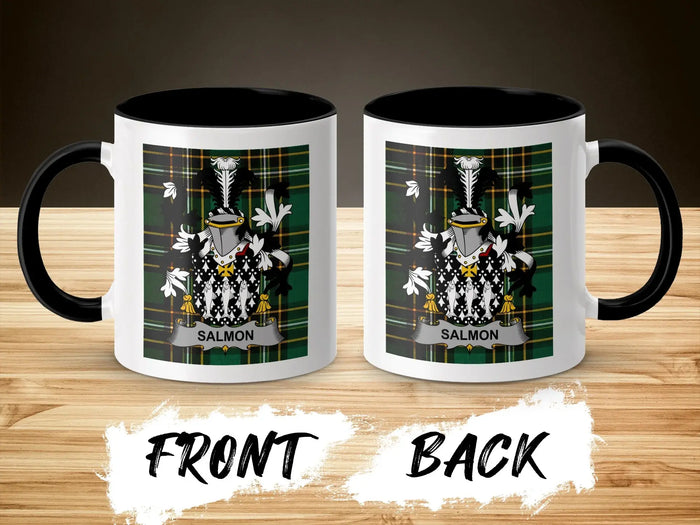 Salmon ceramic mug with black handle and family crest on tartan background