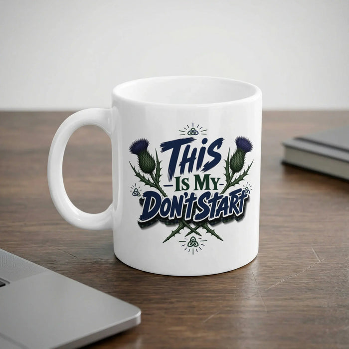 White mug with "This is my don't start" text and thistle design.