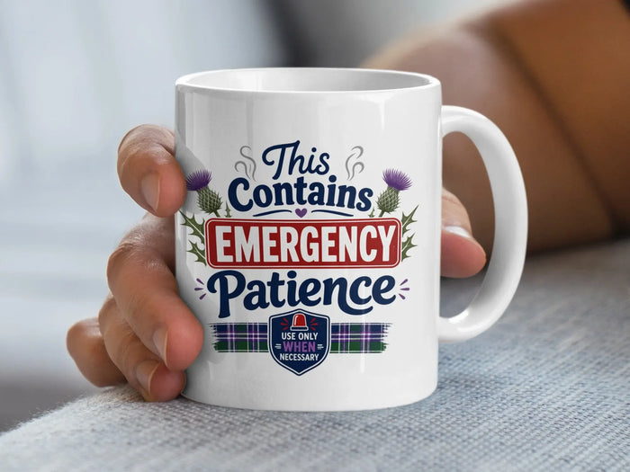 White mug with "This Contains EMERGENCY PATIENCE" text and plaid design.
