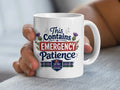 White mug with "This Contains EMERGENCY PATIENCE" text and plaid design.